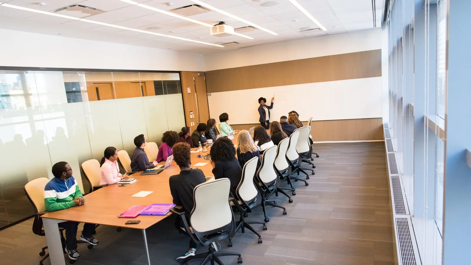 A session underway at a long conference table