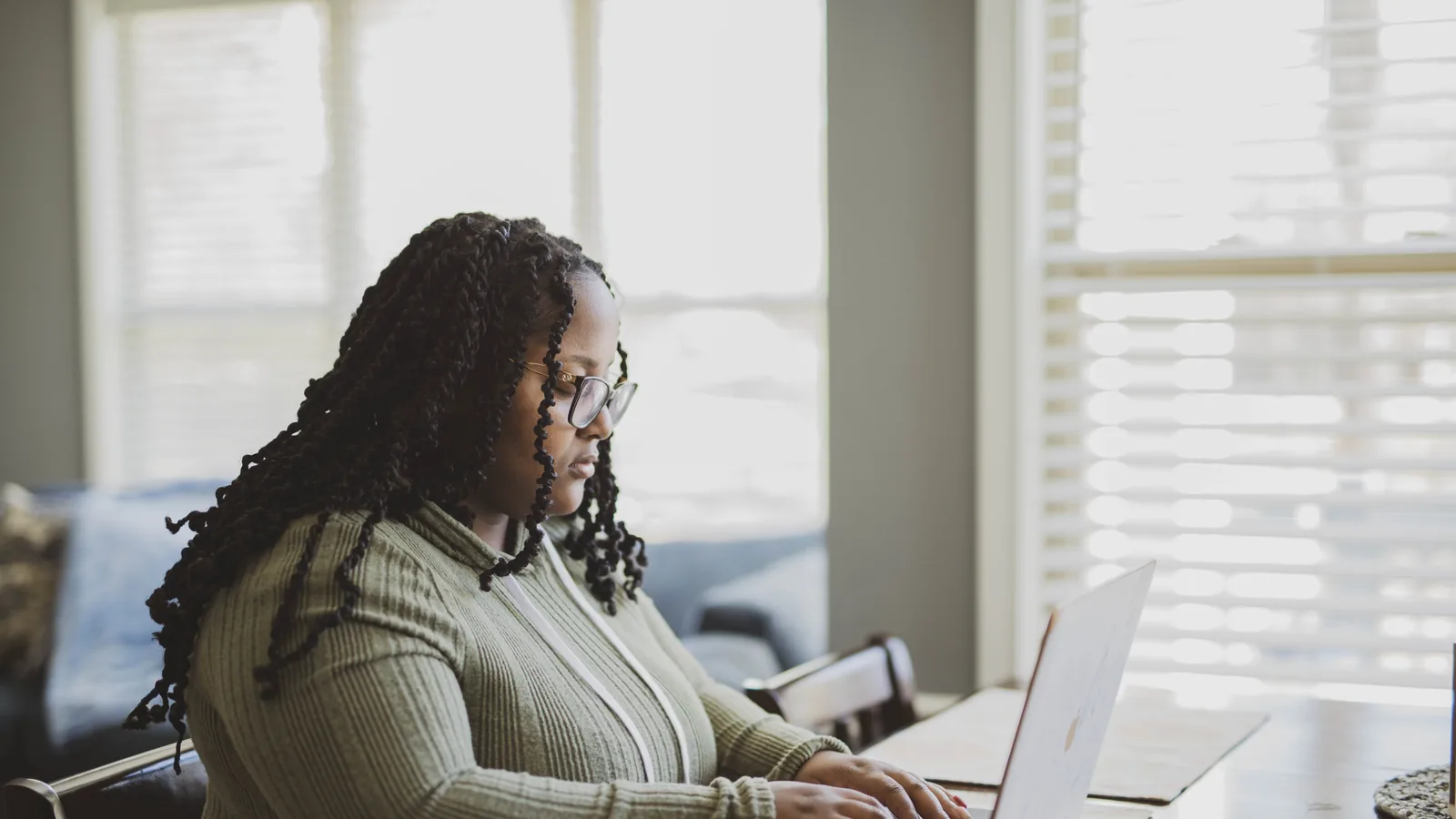 A person studying with a laptop